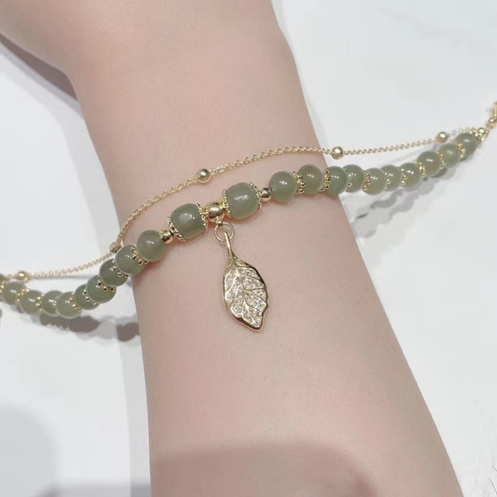 Gelang Tangan Batu Giok Hetian Alami Aksen Daun Emas Untuk Wanita