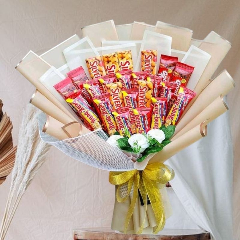 

Buket coklat beng beng , buket hempers , buket snack coklat , buket wisuda , buket coklat silverqueen , buket bunga