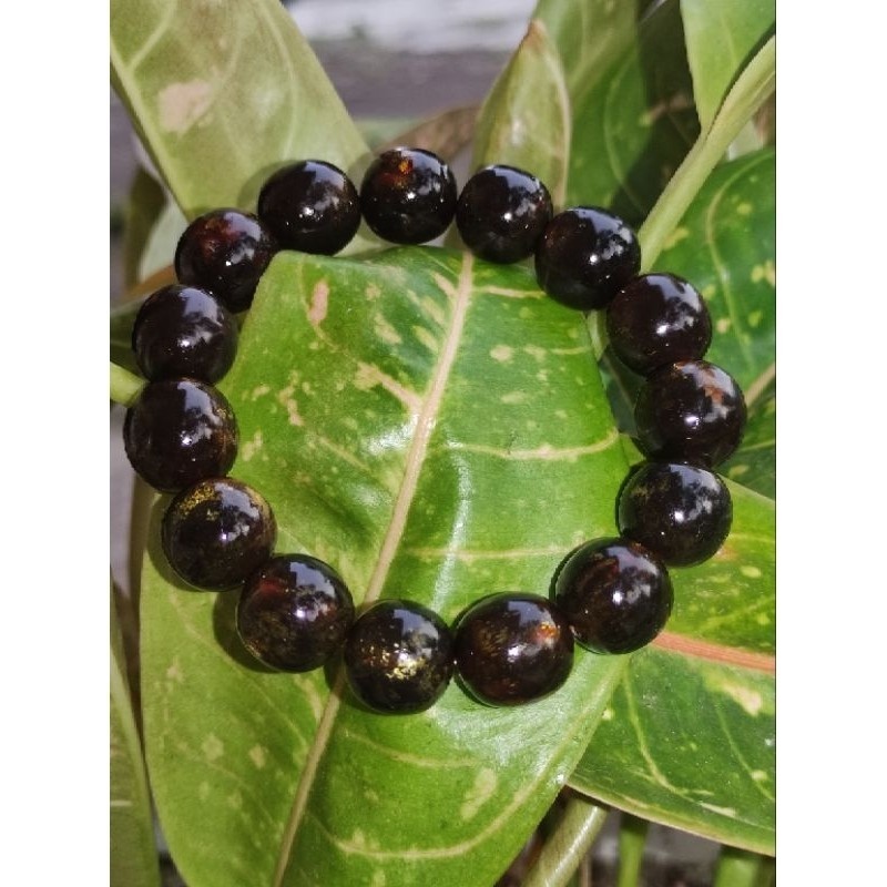 GELANG TASBIH FOSIL AKAR BAHAR HITAM TEMBUS CAHAYA