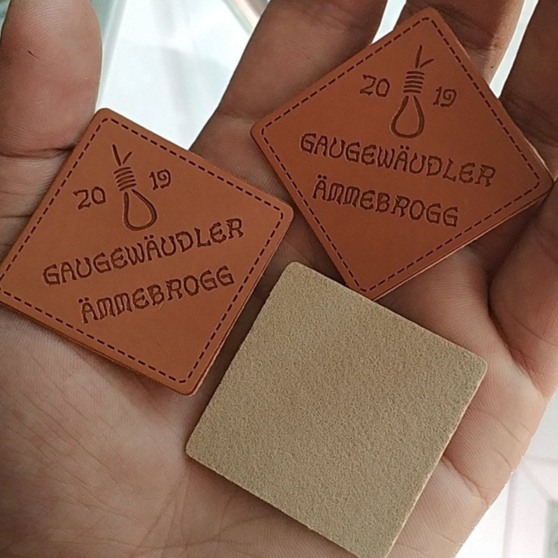 

500PCS Custom Brown engraved text pu leather labels 4 * 4 cm emboss logo label clothing tag