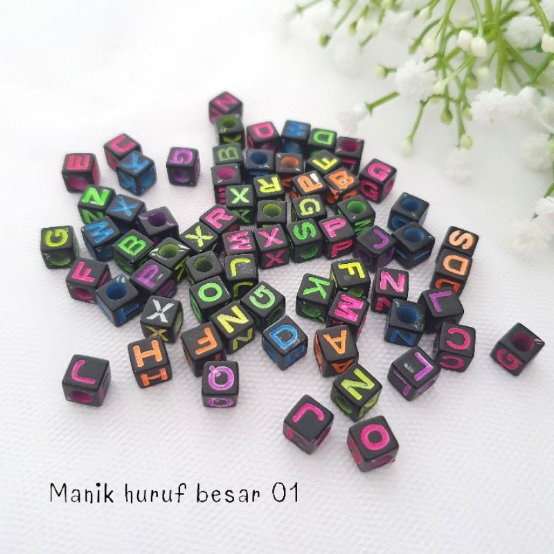 Manik Huruf Besar