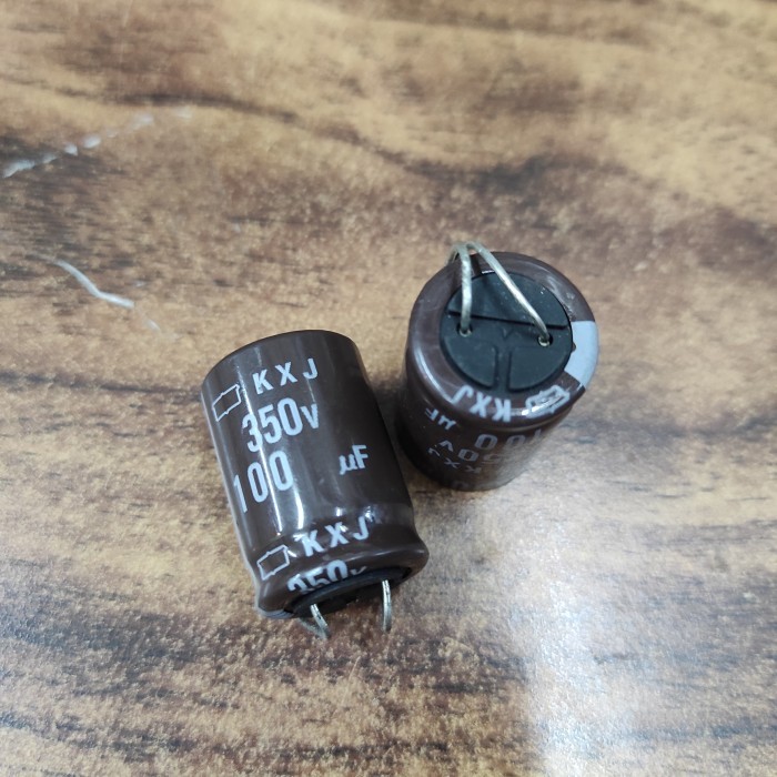 AM99 capasitor 100uf 350V coklat 105°c