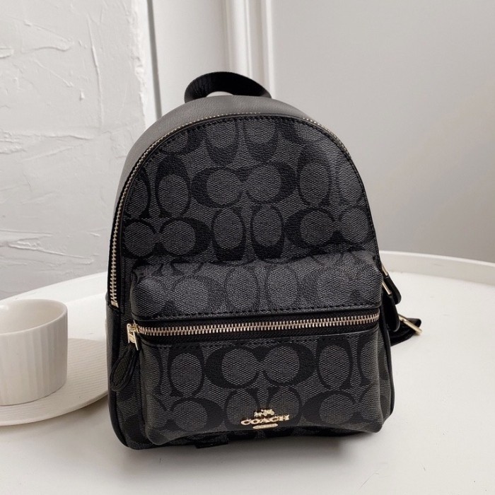 Ċöāĉħ MINI CHARLIE BACKPACK IN SIGNATURE CANVAS BLACK