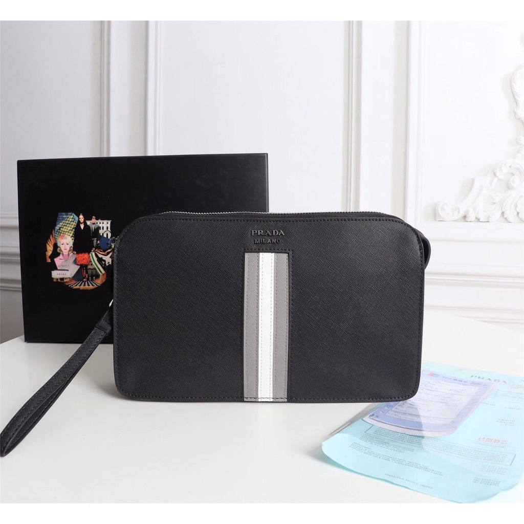 The new Prada men's black cowhide clutch with a long zipper logo in a collision coloured stripe clut