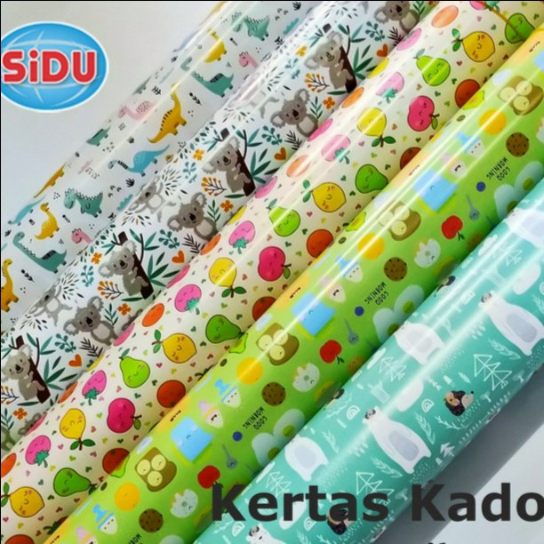 

GROSIR KERTAS KADO MOTIF SIDU / SINAR DUNIA / 50lembar