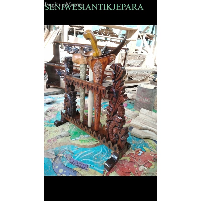 

Jagrak keris isi 3 ukir naga 275rb antik