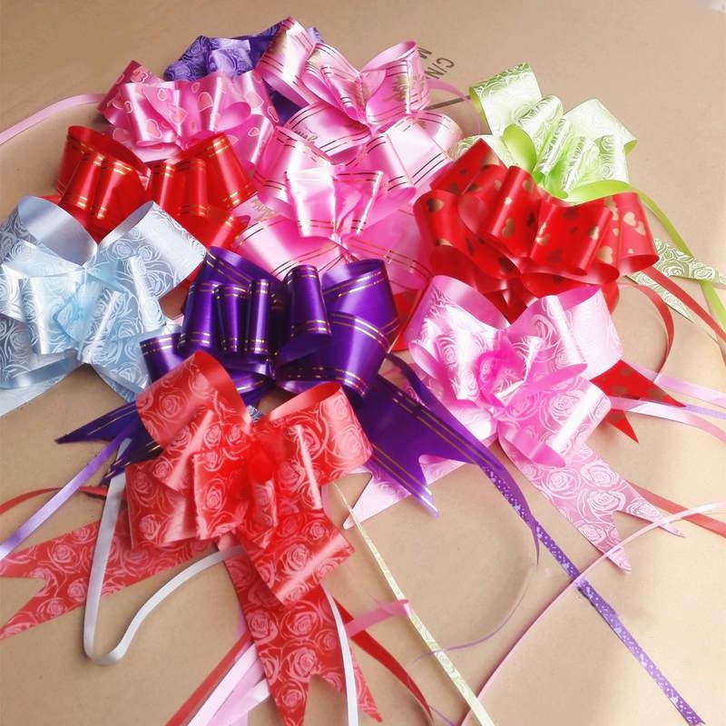 

17A. PITA TARIK UK PANJANG 48cm LEBAR 3cm ISI 10pc PITA SERUT PARCEL KADO PITA CANTIK