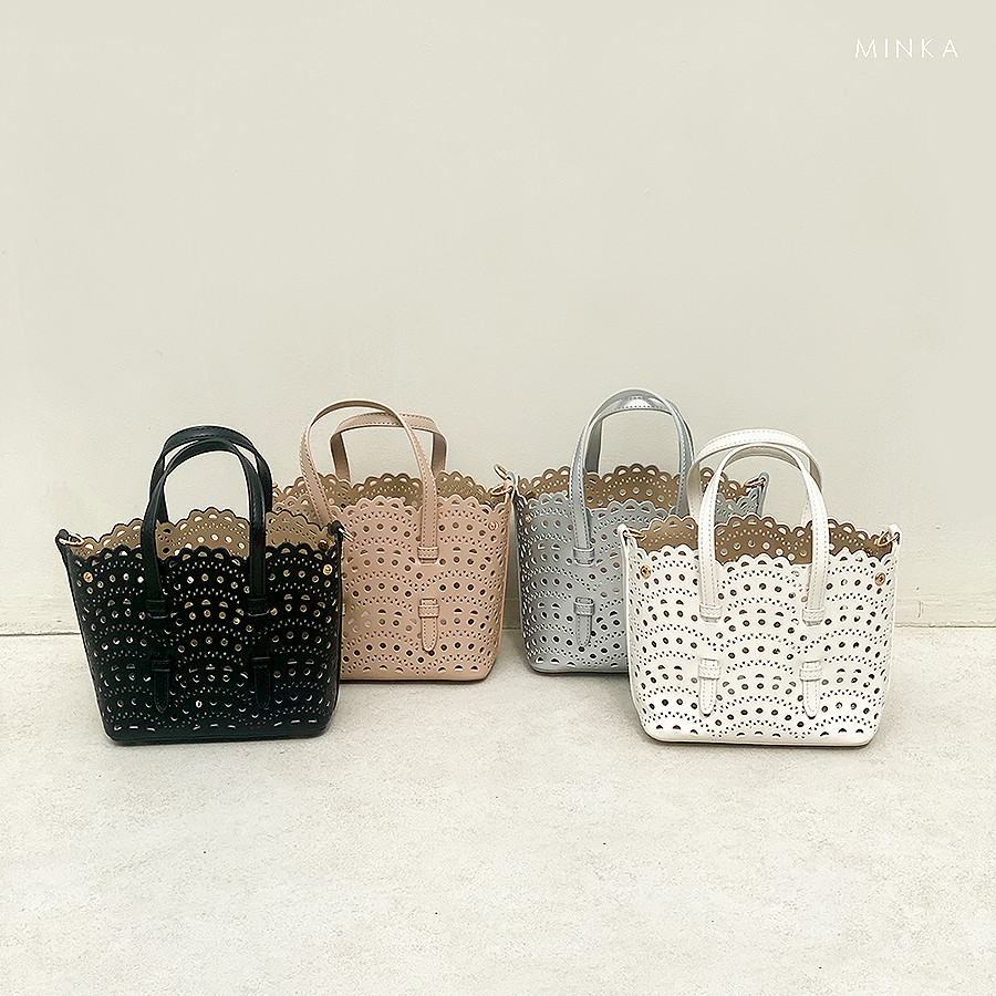 MINKA ALA Laser Cut Hand Sling Bag