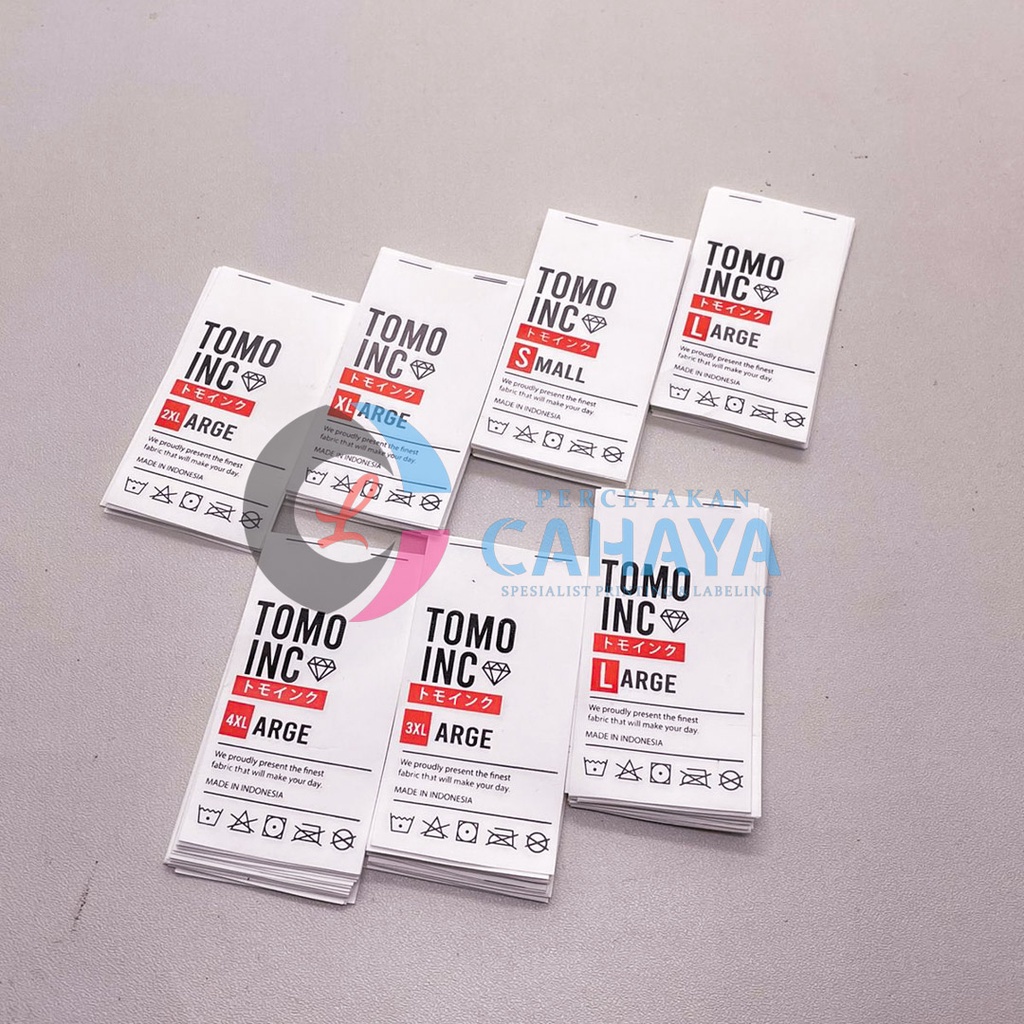 

tag wash, label sattin tebal import 160 meter, label tagwash pakaian, label baju premium, label baju custom, label sattin printing, tagwash