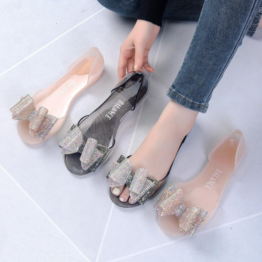 Sandal Jelly Wanita Cantik Transparan Teplek Flat Model Pita Impor