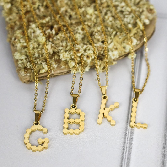 Grosir- Set Kalung/Gelang/Anting Huruf Gelombang Import Titanium Anti Pudar Harga Grosir
