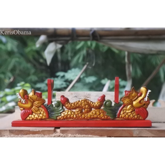 

jagrak rak pedang golok keris pancing ukir naga kyu keras akasia maoni termurah