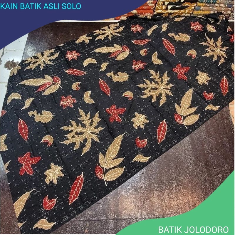 Kain Batik Solo Katun Cabut motif daun pepaya hitam