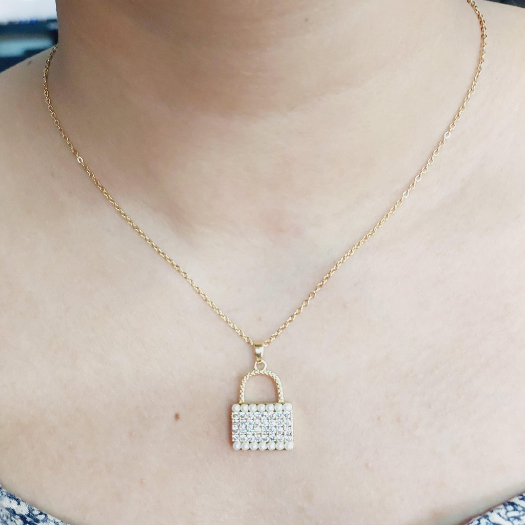 TITANIUM kalung koye liontin TAS cantik mata putih KY038