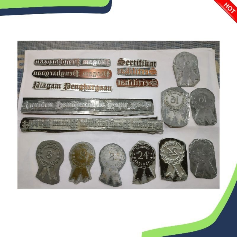 CETAK PLAT BESI POLY EMBOS /PLAT UNTUK HURUF & LOGO  TIMBUL  BERWARNA PADA KERTAS