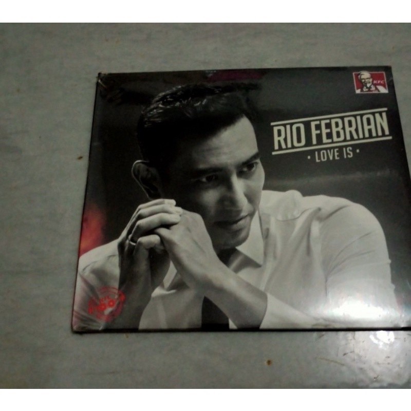 CD ORIGINAL RIO FEBRIAN - LOVE IS