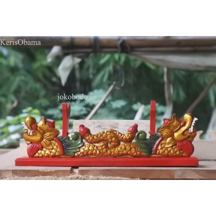 

jagrak rak pedang golok keris pancing ukir naga kyu keras akasia antik termurah