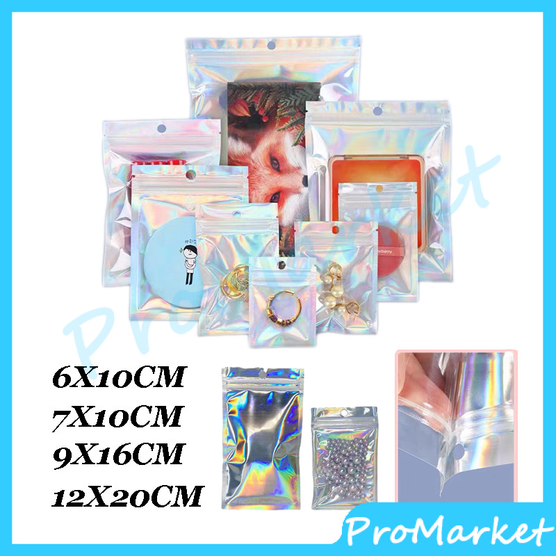 

Plastik Klip Hologram Flat / Ziplock Hologram Foil / Plastik Klip Kemasan Aksesoris / Ziplock Hologram / Plastik Ziplock Zip Lock Klip Packing Aksesoris Display Hologram