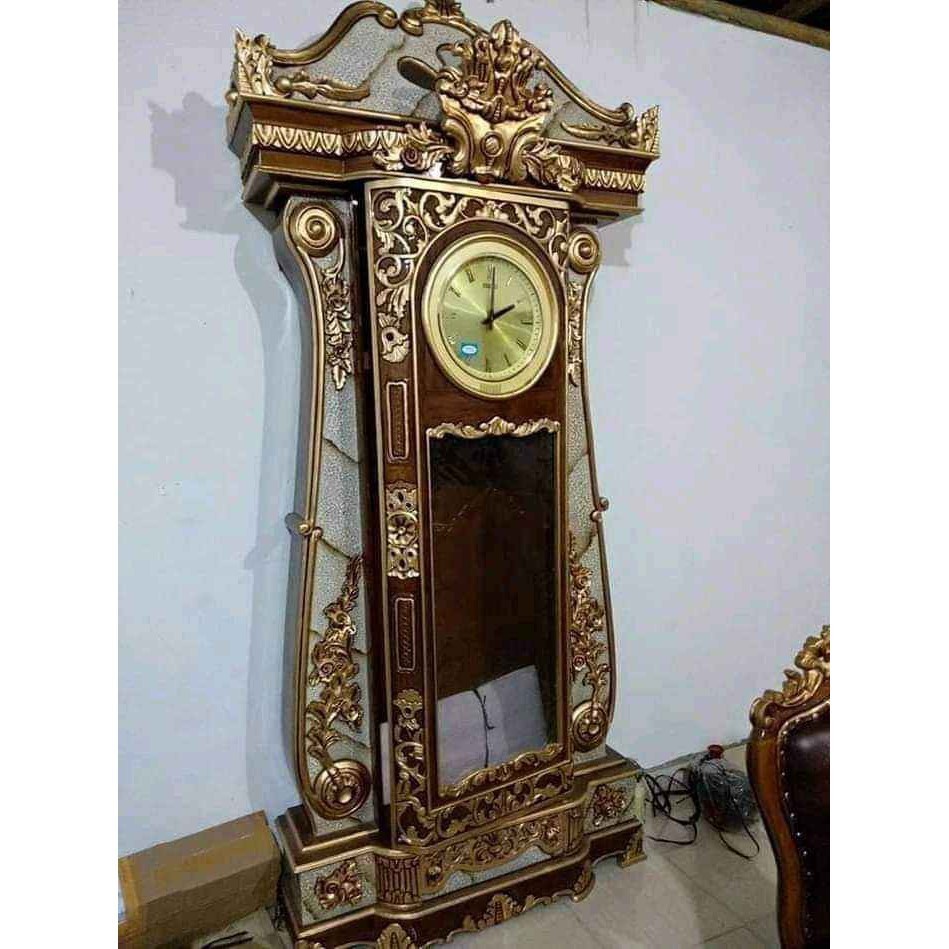 Lemari Jam Hias Jati Ukir Jepara Gong Ukir