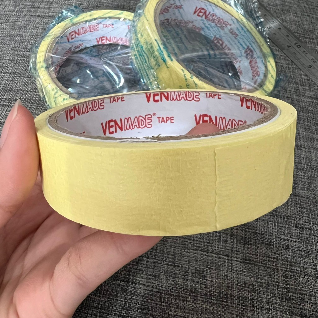 

LAKBAN KERTAS KECIL 1 inch ( 24 MM x 10 Meter ) / ROLL MERK VENMADE Terlaris