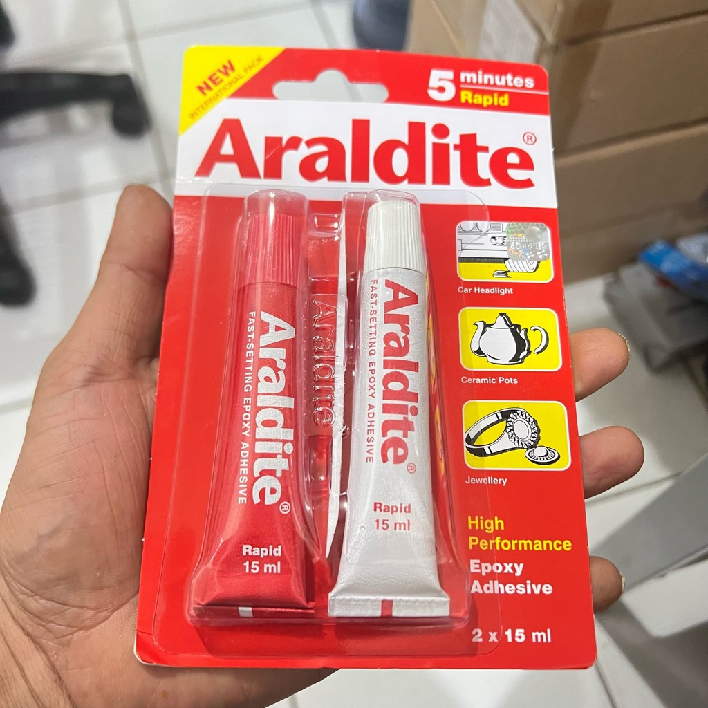 

Lem Epoxy Besi Araldite Rapid 5 Menit Merah