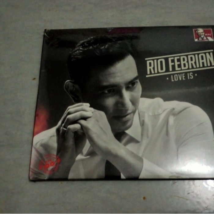 CD ORIGINAL RIO FEBRIAN - LOVE IS