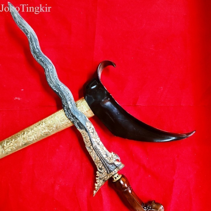 

KERIS PANIMBAL KINATAH KAMAROGAN PAMOR NGULIT SEMONGKO antik