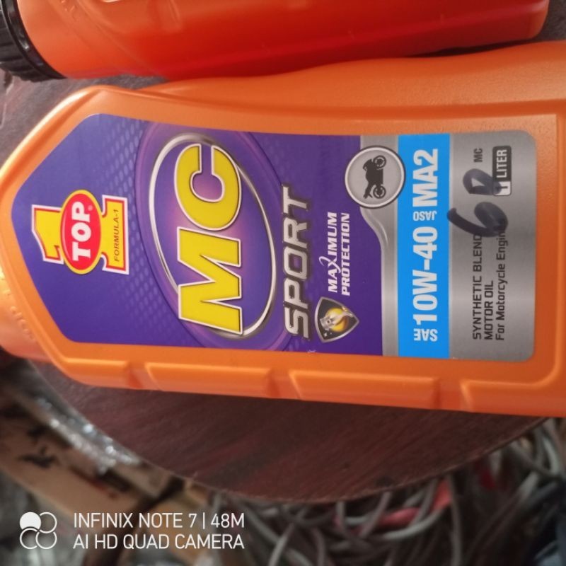 oli mesin 10w40 1l top 1 mc sport
