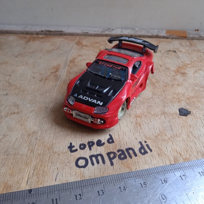 Toys diecast kentoys toyota supra tooned merah