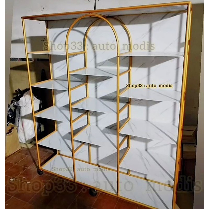 RAK RUANG TAMU SEKAT LEMARI BUFET BESAR PEMISAH PEMBATAS PAJANGAN EMAS BESI BONGKAR PASANG PARTISI SERBAGUNA ESTETIK AESTHETIC MINIMALIS FURNITURE MODERN INDUSTRIAL DISPLAY SALON BUTIK TAS SALON TOKO MALL HANGER GANTUNGAN ORGANIZER BUKU ETALASE KOSMETIK