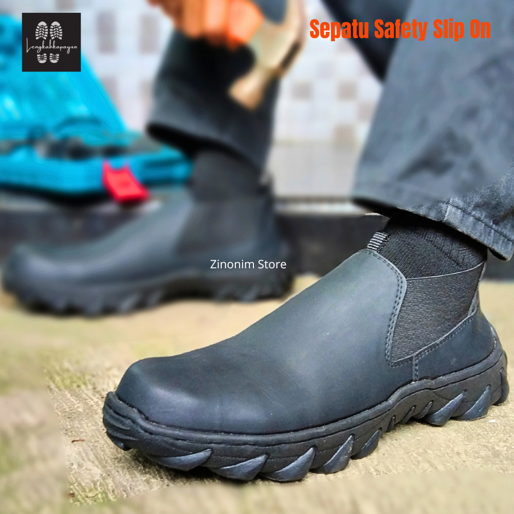 A7 Sepatu Ujung Besi Pria Safety Shoes Hitam Slip On Tanpa Tali