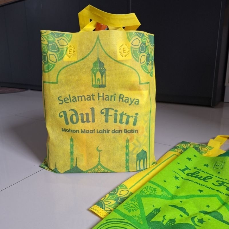 

TAS Lebaran isi 12Pcs/kantong Parcel Bahan SponBond/Wadah Parcel/Tempat Parcel