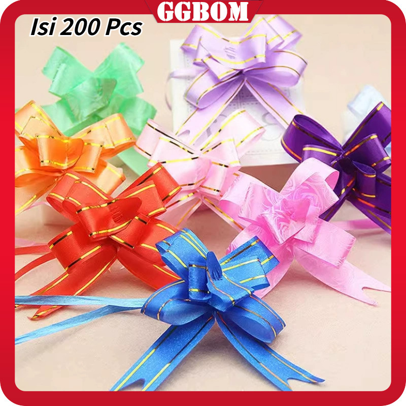 

Isi 200 Pcs Pita Tarik 18mm Lis Emas Serut Besar Hiasan Parcel Souvenir Pull Flower Ribbon Gold Stripes / Pita Hiasan Hampers / Pita Kado Parcel