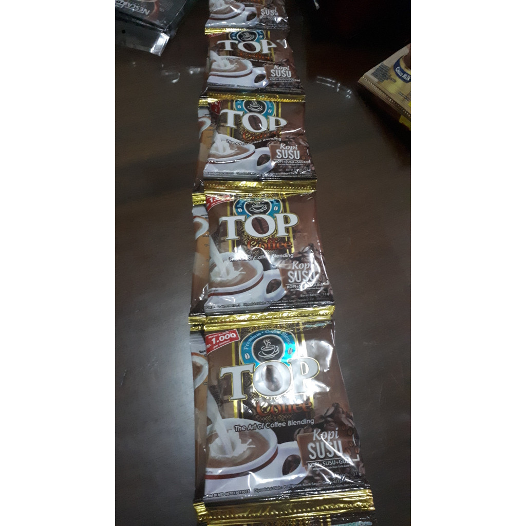 

TOP susu isi 10 sachet