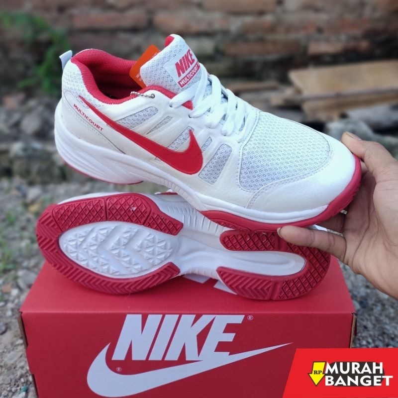 Sepatu olahraga- Sepatu Tennis pria Sol karet mentah warna putih , sepatu bulutangkis pria sol karet