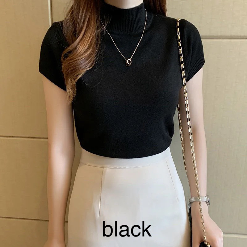 Blouse lengan pendek knit kerah tinggi