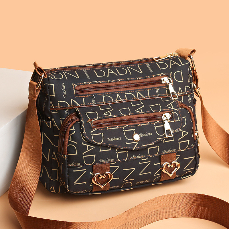 Tas Kanvas Wanita Paruh Baya dan Lansia Tas Bahu Oxford Banyak Saku Tas Kurir Ibu Tas Bepergian