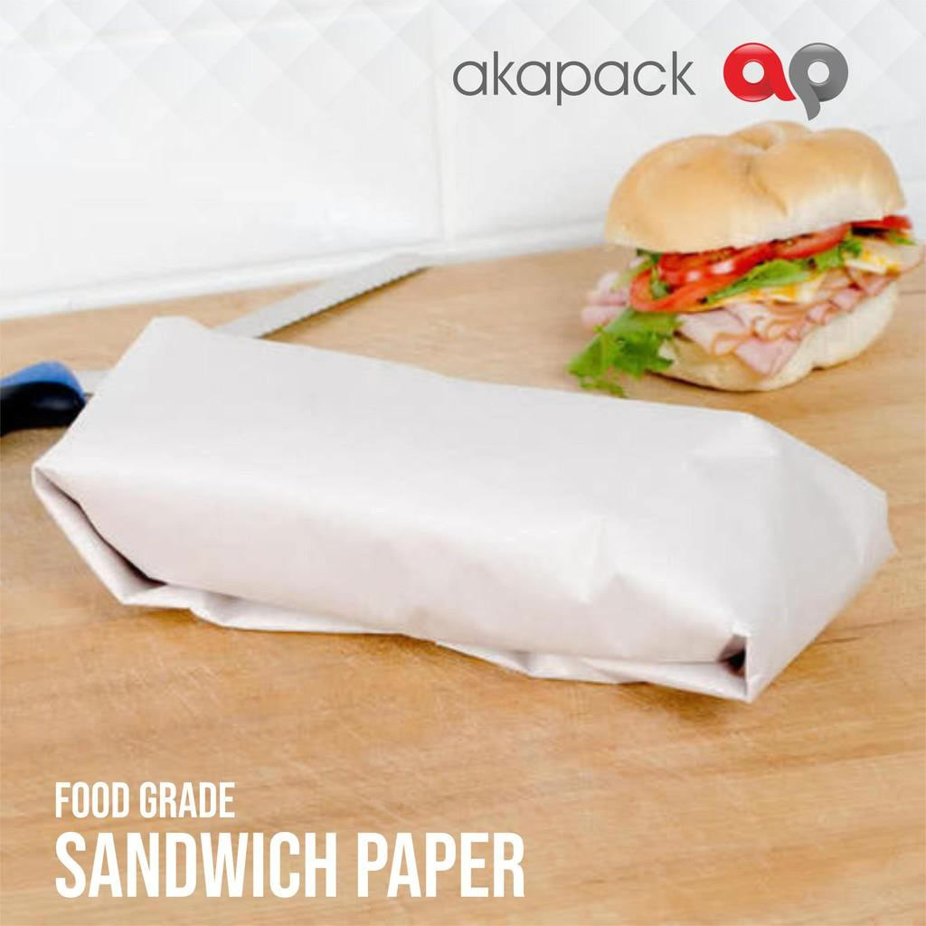 

Dragon Pack sandwich paper kertas nasi 30x30 isi 100lbr kertas anti lengket