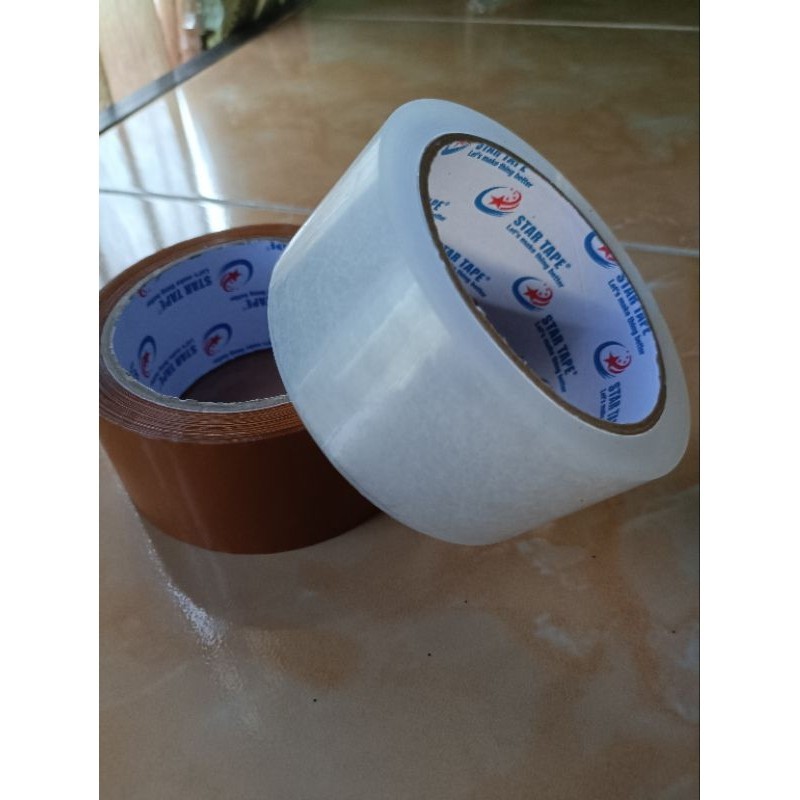 

Lakban Packing MPI Master Packing Indonesia Clear Bening ( Putih ) Dan Coklat 90 Yard 45 mm ( 2 inch ) Isolasi packing