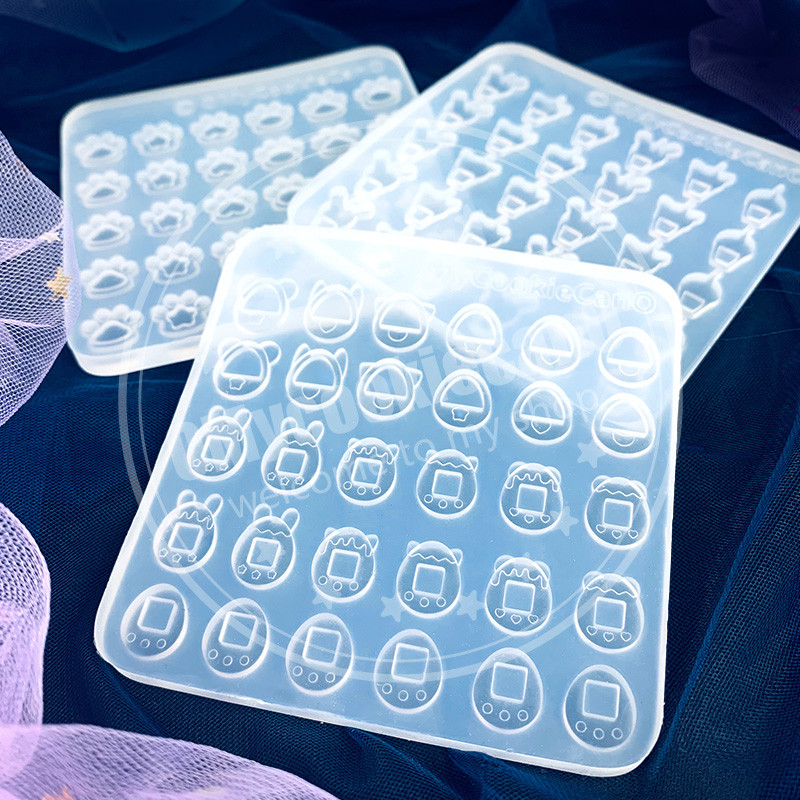 

Silicon Resin Mold -uv-Epoxy Resin Craft Mold - Super cute 30 pieces mini tamagotchgame console, all transparent silicone mold.