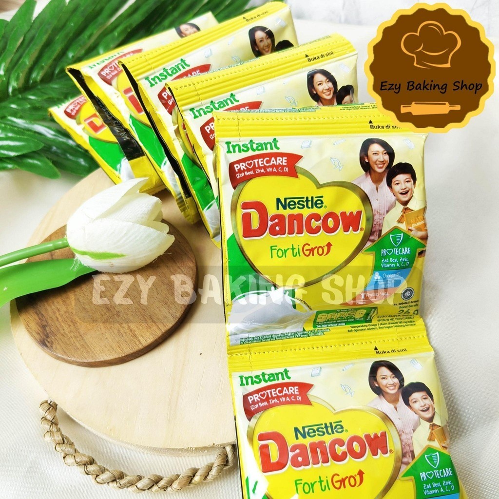 

Susu bubuk DANCOW sachet 10x27gr (isi 10)