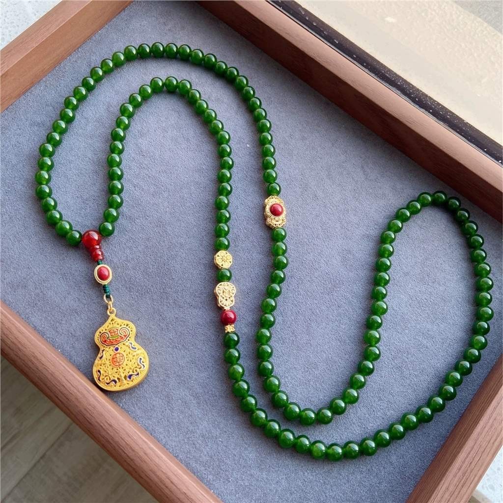 Chinese court style jade round bead gourd pendant with multiple necklaces worn by women