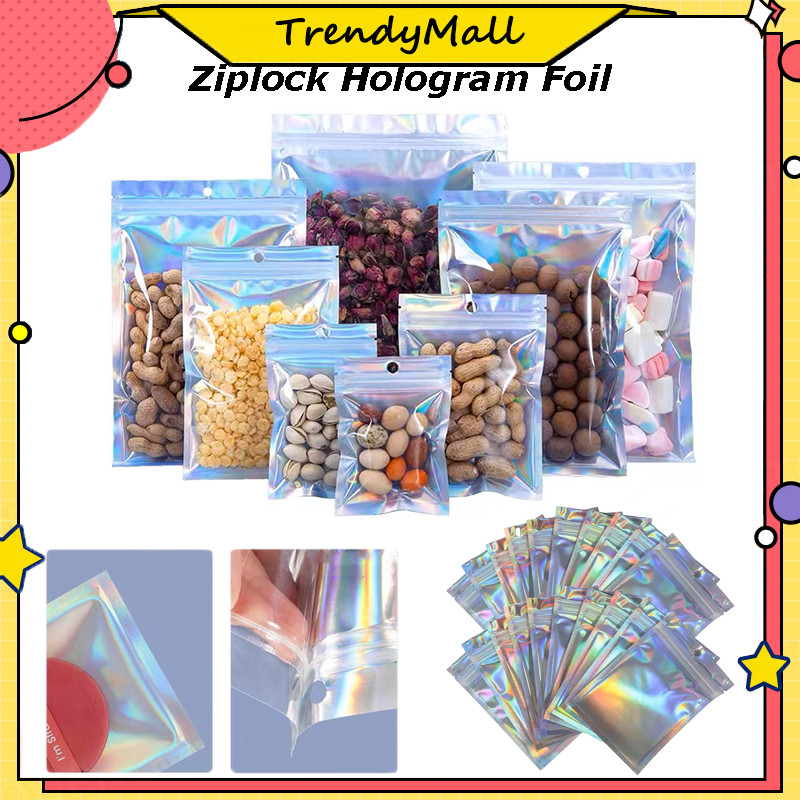 

Plastik Klip Hologram Flat /Bumbu Plastik Kemasan Hologram/plastik ziplock hologram rainbow/aluminium foil plastik klip packaging /Plastik Klip Ziplock Zipper Hologram Bening Souvenir