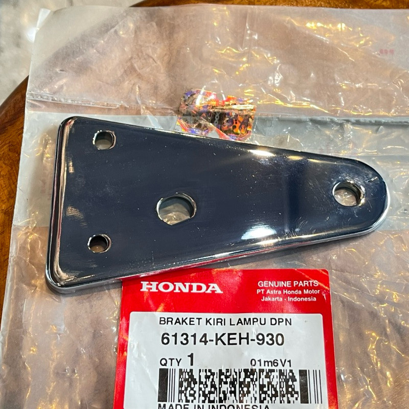 BRAKET KUPINGAN DUDUKAN LAMPU DEPAN MEGAPRO TIGER LAWAS TIGER 2000 KIRI ORIGINAL AHM 61314 KEH 930