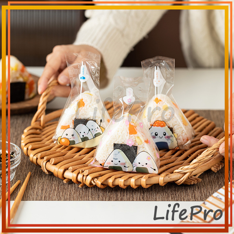 

Plastik Onigiri Segitiga Bungkus Nasi Onigiri Wrapper Plastik OPP Kimbab Sushi Roti Kue Isi 50 lembar