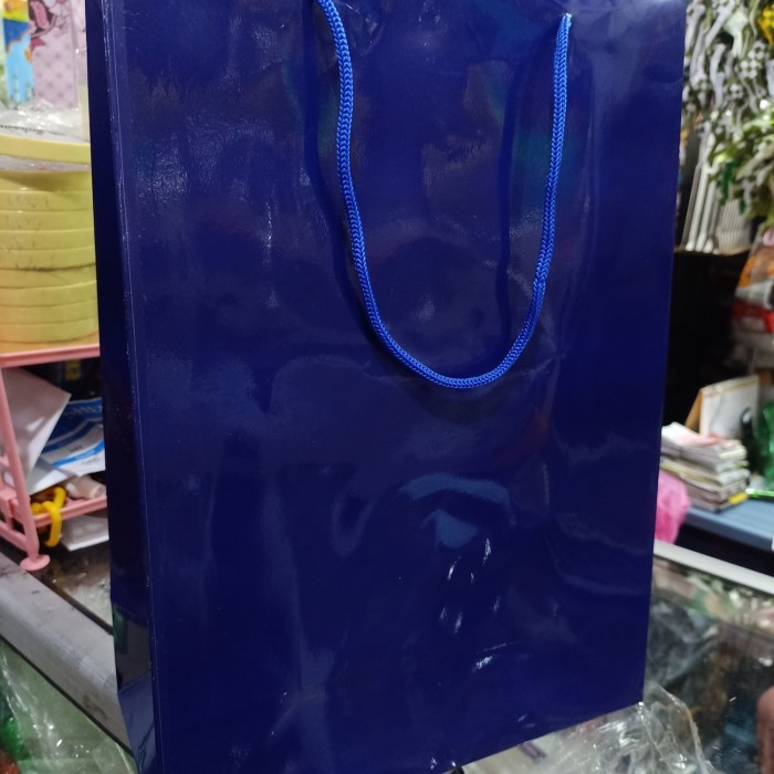 

paper bag polio biru Dongker isi 12 pcs terlaris dan termurah