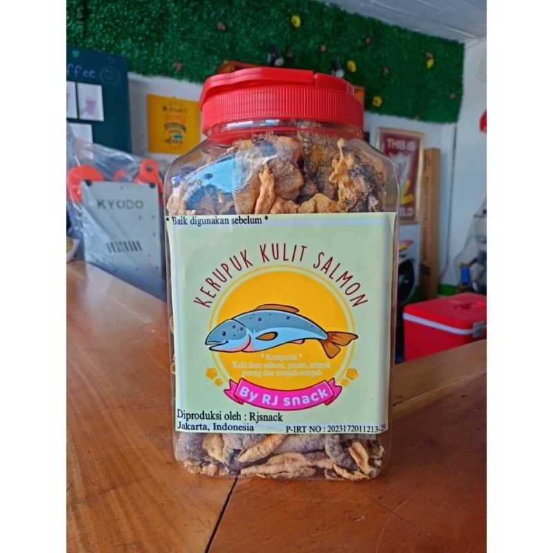 

Kerupuk Kulit Ikan Salmon Cemilan Crunchy Varian Rasa Sapi Panggang Kemasan Toples Double Jumbo