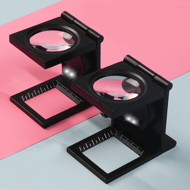 

Kaca Pembesar Kain dan Percetakan LED / Fabric and Printing Loupe / Magnifier LED Kain