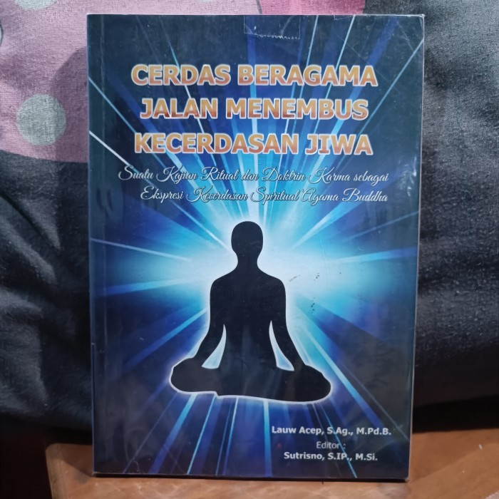 CERDAS BERAGAMA JALAN MENEMBUS KECERDASAN JIWA  Suatu Kajian Ritual dan Doktrin Karma sebagai Ekspre