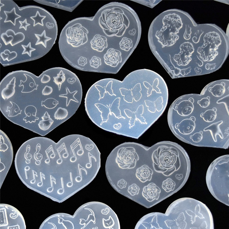 

Silicone Mold Tiny Nail Art Star Flower Heart Cat Letter Shell Epoxy Resin Casting Molds For DIY Epoxy Resin Nail Art Crafts
